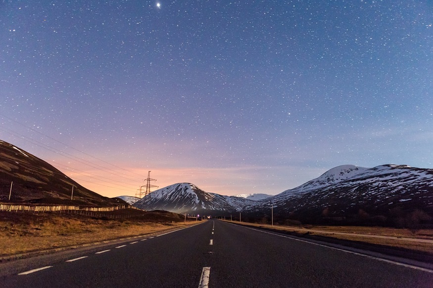 scotland road trip, road through Pitlochry with a starry sky